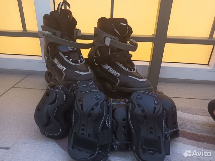 Роликовые коньки