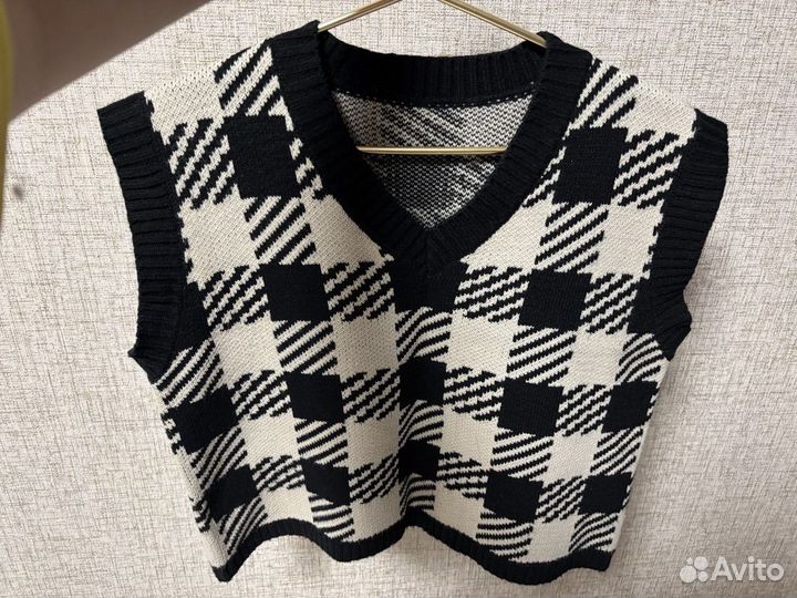 Жилетки женские