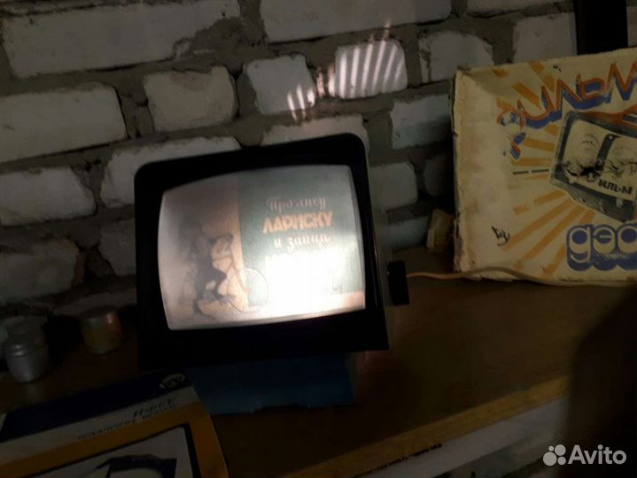 Диапроектор дефи с диафильмами из СССР