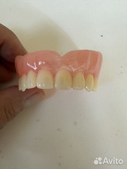 Зубной техник