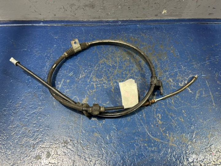 Трос ручника задний левый Mitsubishi Lancer 10 CY