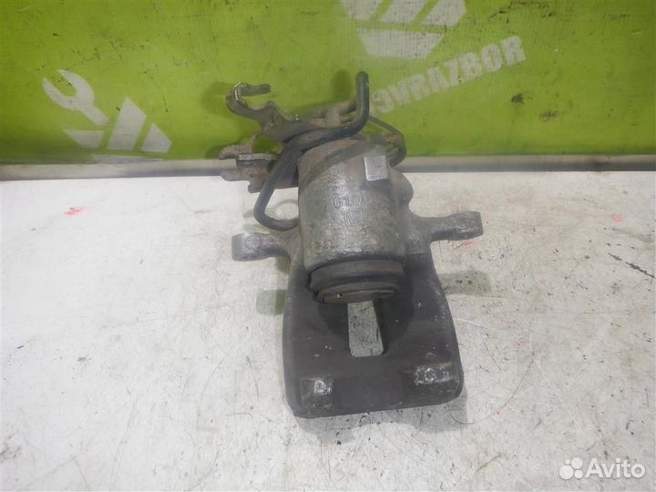 Суппорт задний правый Фольксваген Кадди Кэдди 3