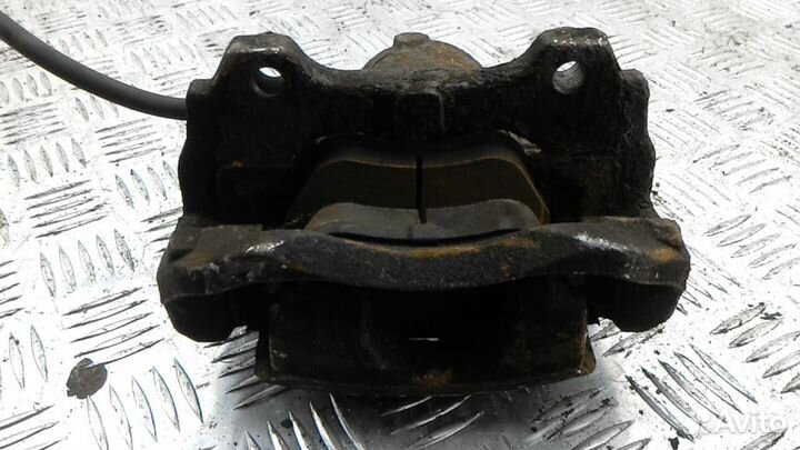 Суппорт передний левый Opel Corsa D рест. 2011