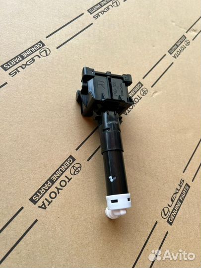 Форсунка омывателя фар правая