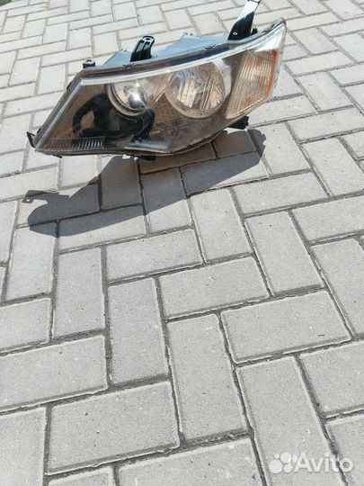 Фара mitsubishi outlander xl левая