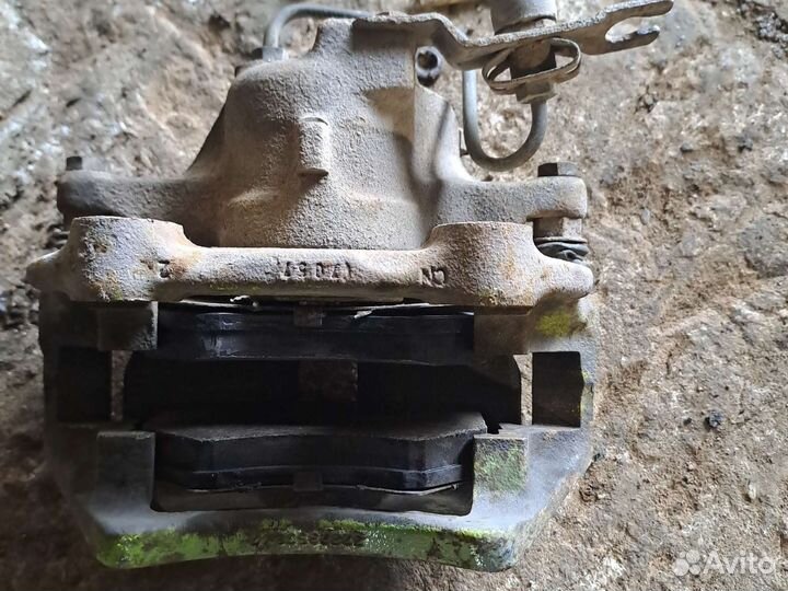 Суппорт передний левый Volkswagen Passat B5