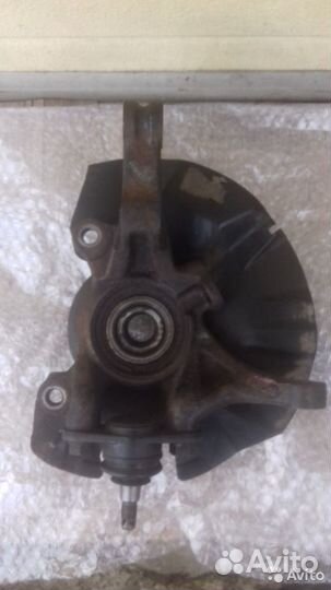 Киа Рио 2 левый поворотный кулак