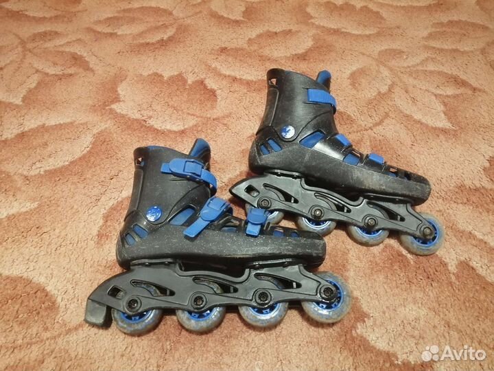 Роликовые коньки