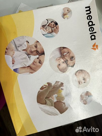 Молокоотсос medela электрический