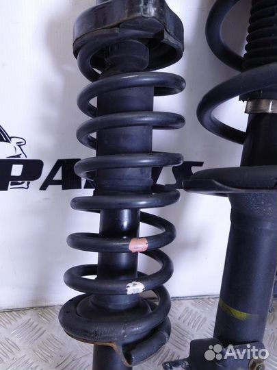 Стойки амортизатора Mitsubishi Outlander XL