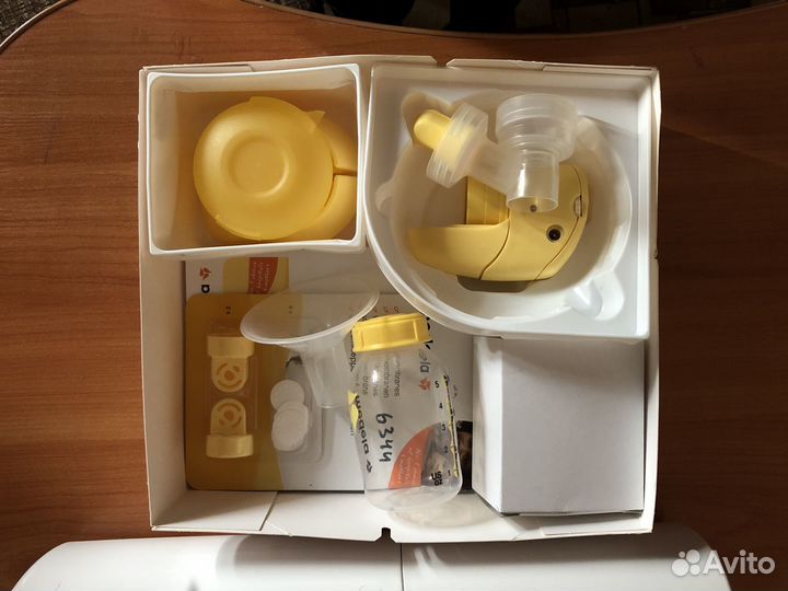 Молокоотсос электрический medela mini