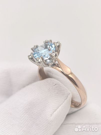 Золотое кольцо с топазом и брилл 585/4.06/19