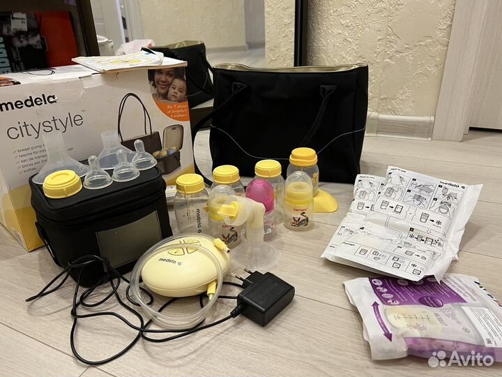 Молокоотсос medela