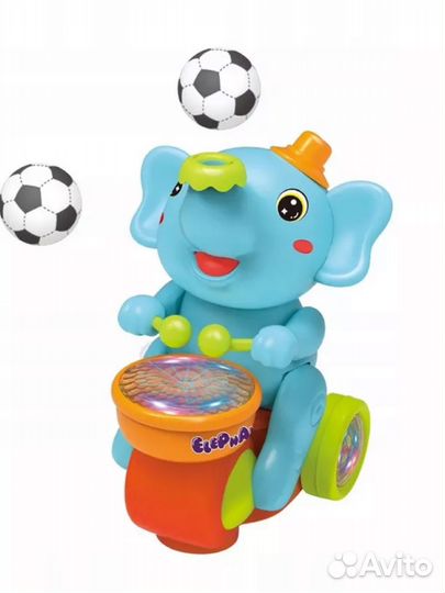 Игрушка слон барабанщик