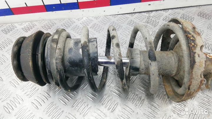 Стойка амортизатора переднего правого Opel Astra G