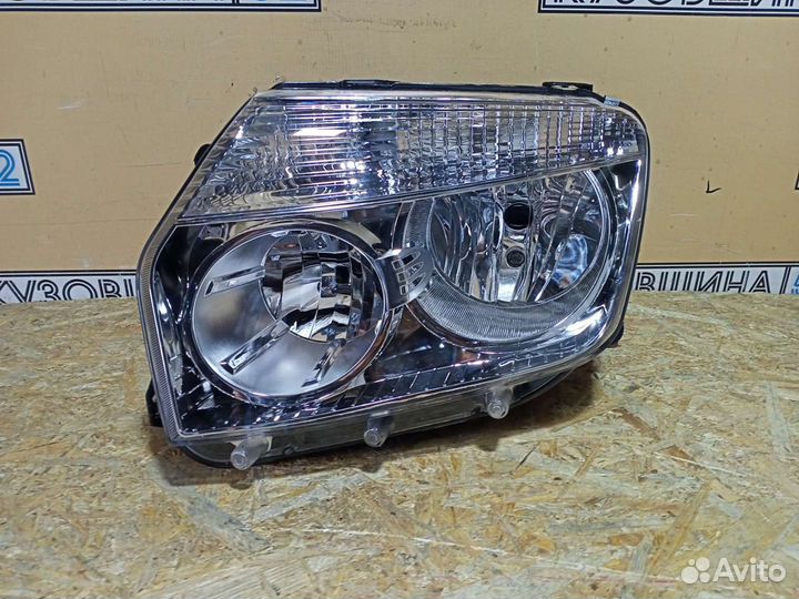 Фара левая Renault Duster (10-15г) хром