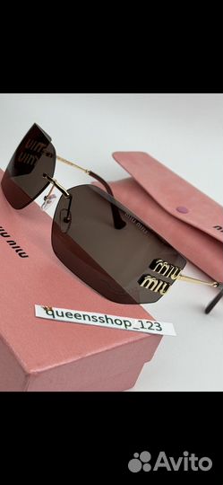 Солнцезащитные очки Miu Miu