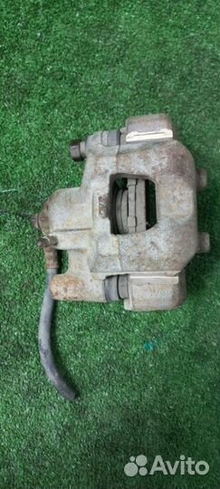 Суппорт тормозной задний левый Toyota Camry ACV30