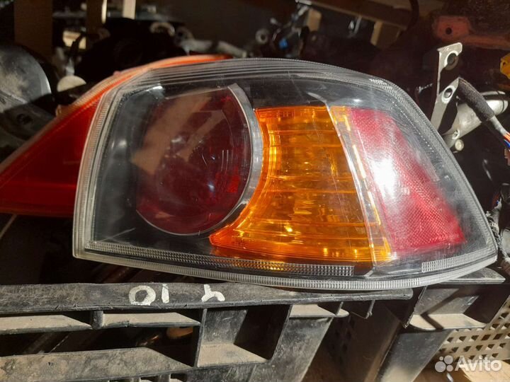 Фонарь задний правый левый mitsubishi lancer 10