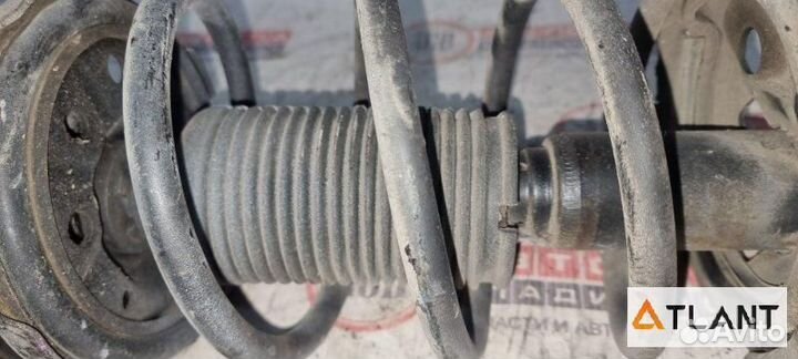 Стойка передняя левая toyota carina