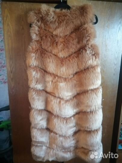 Жилетка меховая женская