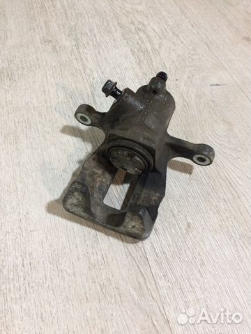 Суппорт тормозной задний правый Солярис Рио 3