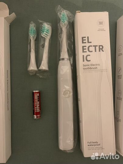 Электрическая зубная щетка