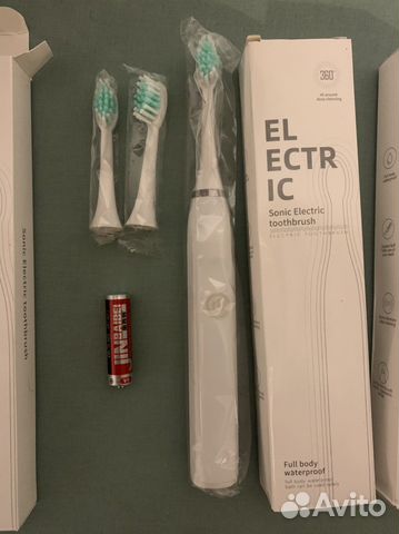 Электрическая зубная щетка