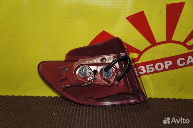 Фонарь Mazda Demio