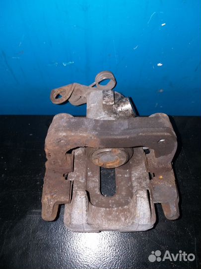 Суппорт тормозной задний левый Ситроен С4