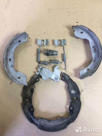 Комплект левый задн регул стояночного тормоза