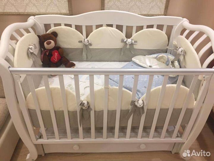 Детская кроватка с продольным маятником Юлиана