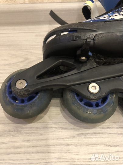 Роликовые коньки