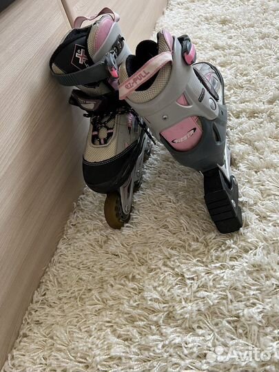 Роликовые коньки