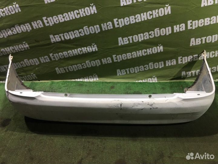 Бампер задний Mazda Familia BJ ZL 1999