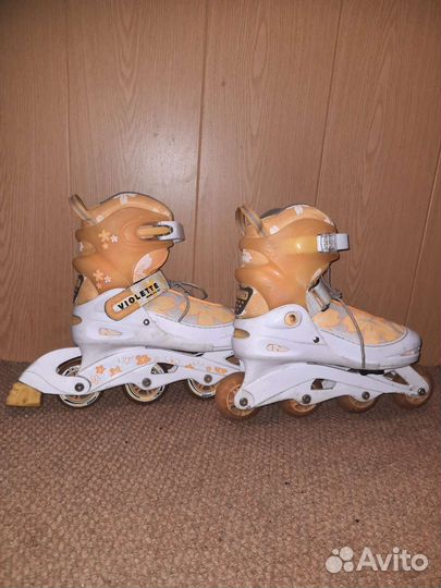 Роликовые коньки женские