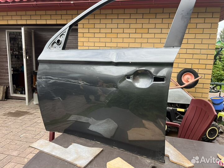 Дверь Mitsubishi Outlander