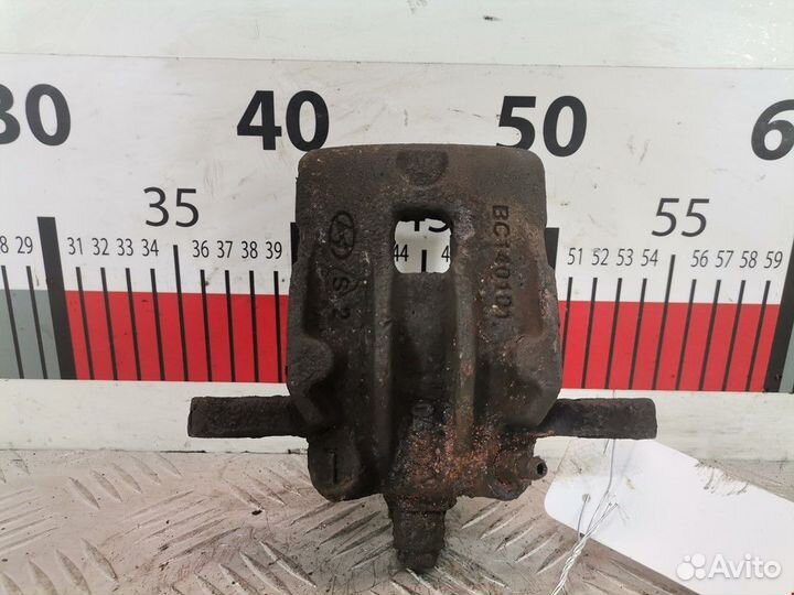 Суппорт задний левый Hyundai i20 PB 2010