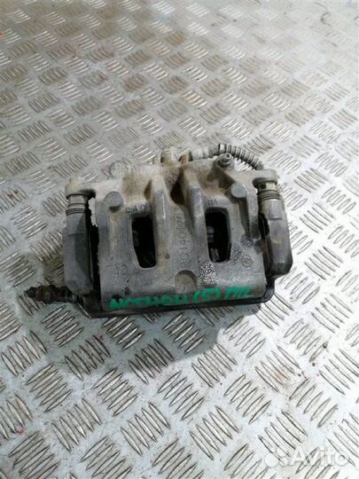 Суппорт тормозной передний левый Ssangyong Actyon