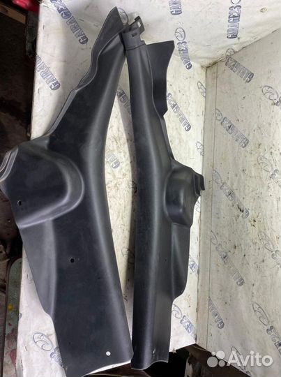 Обшивка задней арки Mazda 3