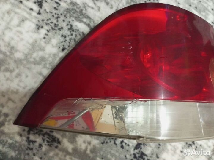 Задний фонарь opel astra h седан