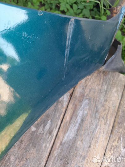 Крыло mazda 323