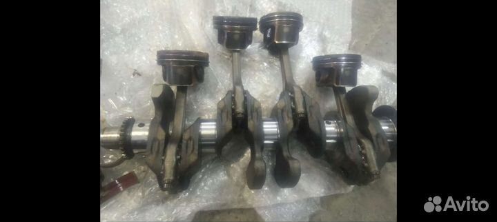 Коленвал в сборе с поршнями