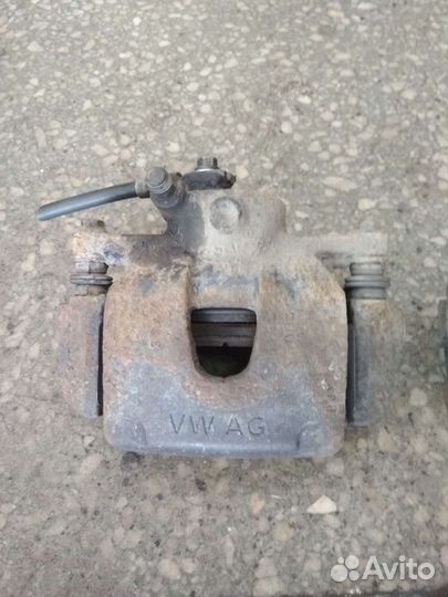 Суппорт тормозной передний Поло Седан