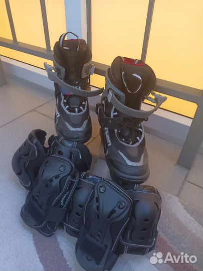 Роликовые коньки