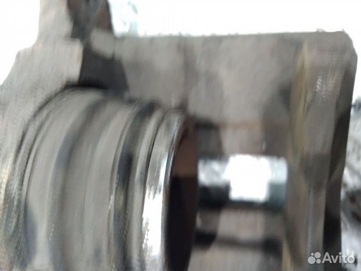 Суппорт тормозной передний левый Логан, Сандеро