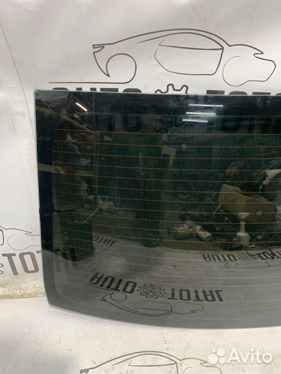 Стекло заднее Renault Logan K7J710 2008