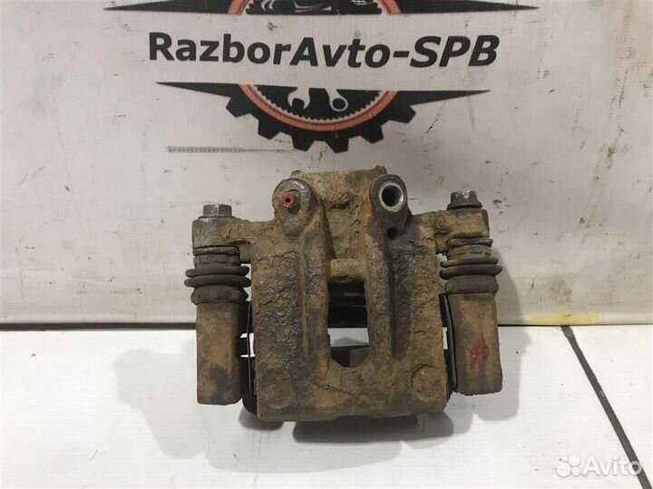 Суппорт задний правый Toyota Corolla E12