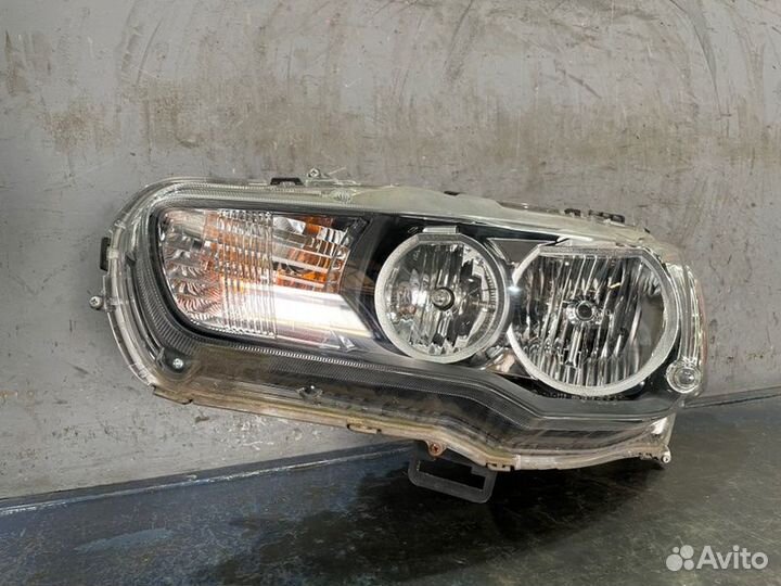 Фара галоген левая Mitsubishi Lancer 10 CY