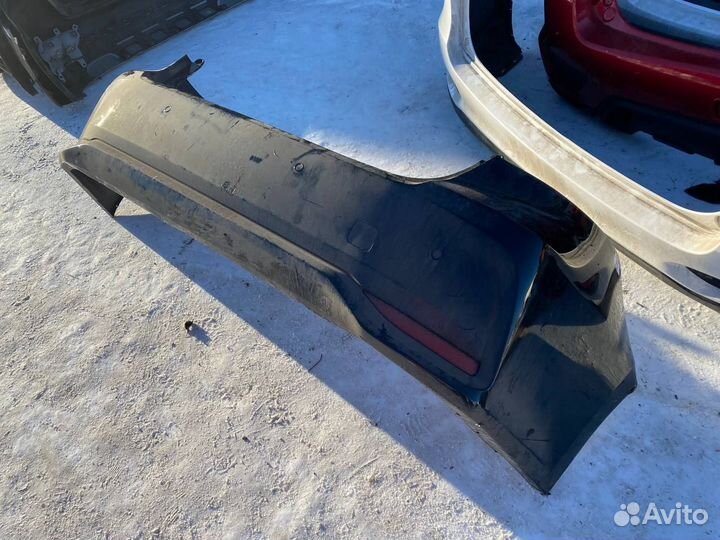 Задний бампер Toyota Corolla E210